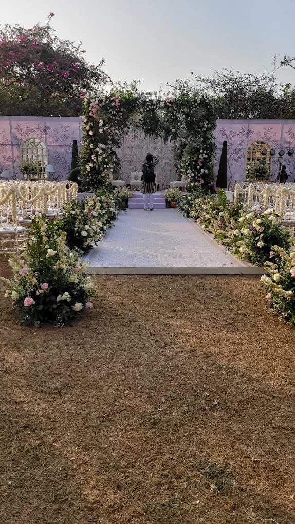 Open-Air Garden Wedding Aisle and Botanical Floral Arch